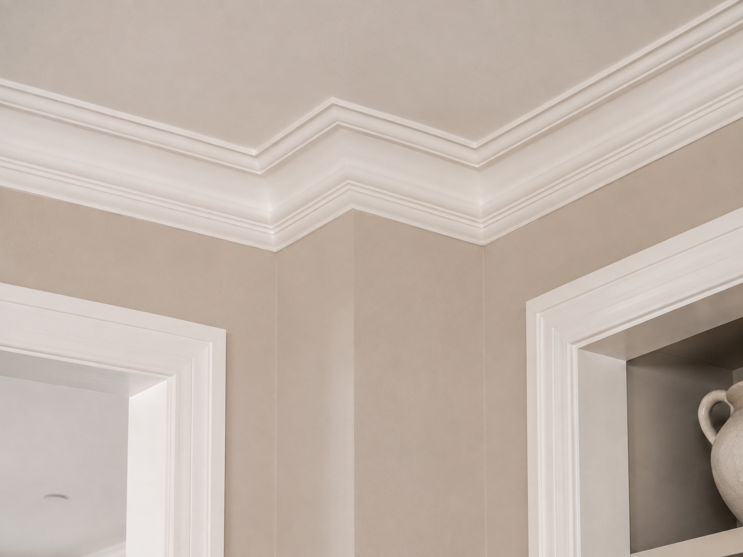Crown moulding through connected interior spaces
