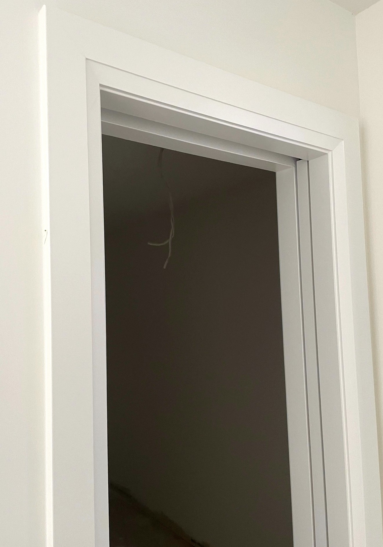 Pocket door installation and interior finish carpentry